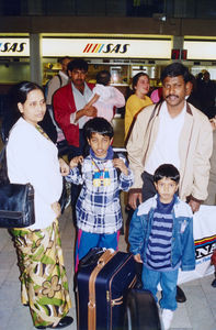 Pastor Socrates with family upon departure from Denmark in 1995