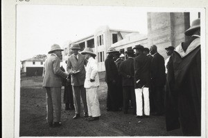 Different groups in conversation at the opening ceremony