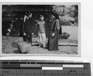 A Maryknoll Sister with neighbors at Meixien, China, 1938