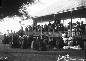 Swiss missionaries and African people in front of a building at Elim Hospital, Elim, South Africa, ca. 1901-1915