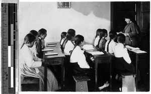 Sister Gabriella Mulherin, MM, conducts class at Industrial School, Yeng You, Korea, ca. 1920-1940