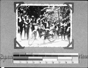 Children gazing at a motor-bike, Ipanya, Tanzania, 1936