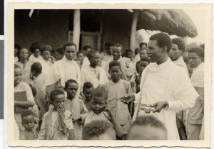 Pastor Dafaa amidst his parish talks about his trip to Europe, Ayra, Ethiopia, 1952