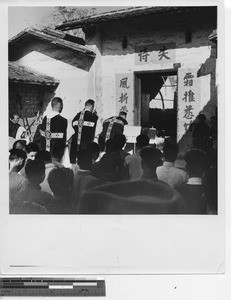 Maryknoll priests at a celebrate Mass outdoors at Wuzhou, China, 1949