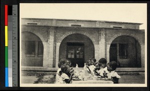 Meal at a home for girls, Congo, ca.1920-1940