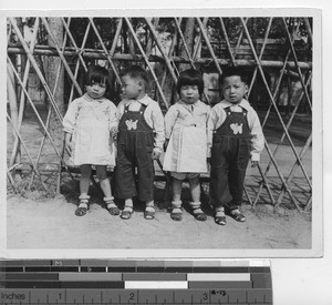 Quadruplets living in Gujiang, China, 1944