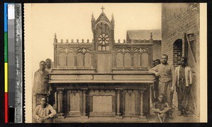 Men standing by a wooden altar, Kisantu, Congo, ca.1920-1940