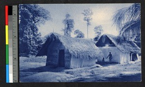 People standing outside thatch-roofed church, Cote d'Ivoire, ca.1920-1940