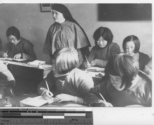 Sister Rita Clare teaching at Fushun Center at Fushun, China, 1940