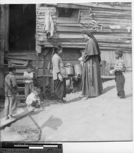Maryknoll Sister on a visit at Meixien, China, 1949