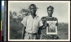 Couple with an image of the Virgin and child, Yoko, Cameroon, ca.1920-1940