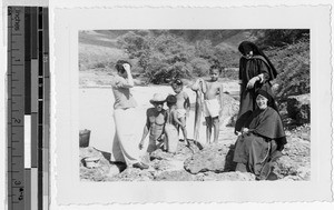 Maryknoll Sisters Alicia and Marcus Marie chat with a family, Waianae, Hawaii, November 1948