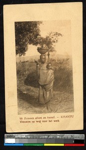 Mother carrying child to work, Kisantu, Congo, ca.1920-1940