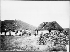 Group of Europeans in front of new mission buildings, Usangi, Tanzania, ca. 1911-1914