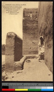 Woman seated by a doorway, Algeria, ca.1920-1940