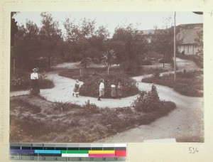 Johannes Einrem with his wife and children in the garden at Midongy, Madagascar, 1901