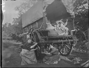 Female missionaries painting a wagon, Mhinga, South Africa, 1899