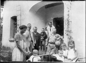 Group portrait of Mr. and Mrs. Winkler, Missionary Blumer with Wilhelm, Missionary Eisenschmidt and other Europeans, Tanzania, ca. 1926-1928