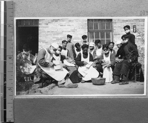 Carding raw wool at Harwood Bible Training School, Fenyang, Shanxi, China, ca.1936-37