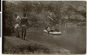 Crossing a river in a rubber boat, Ethiopia, 1929