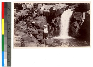 People next to a waterfall, Guangdong, China, ca.1913-1923