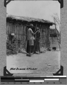 Palpating the glands, Sikonge, Unyamwezi, Tanzania