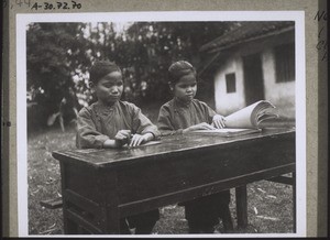 Blind children writing and reading