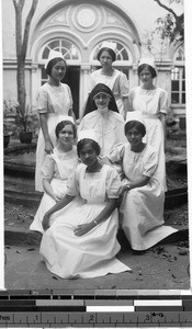 Group portrait of a Maryknoll Sister and six St. Paul's Hospital nurses , Manila, Philippines, ca. 1928