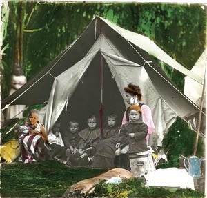 Missionary woman with children at a tent, Tanzania, ca.1904-1910