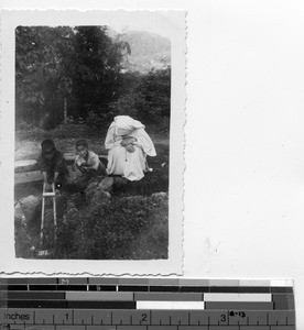 A Maryknoll Sister speaking with children at Dongshi, China, 1939