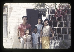 Family outside their home