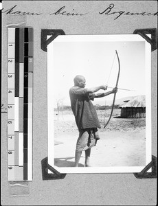 Hunting with a bow and arrows, Nyasa, Tanzania, 1937