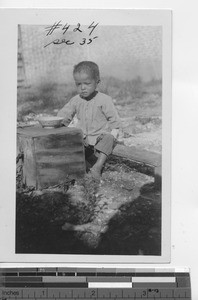An orphan at Luoding, China, 1929