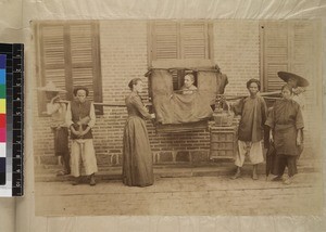 Street scene in Quanzhou, China with female missionary in palanquin, ca. 1894