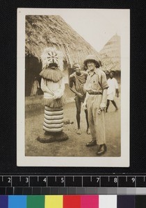 Medical missionary with man in ceremonial costume, Sierra Leone, ca. 1930-1944