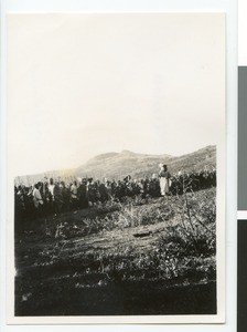 Crowd of African people at the entrance of the king's kraal, Ehlanzeni, South Africa