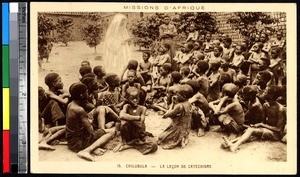 Missionary giving children a Catechism lesson, Chilubula Mission, Algeria, ca.1920-1940