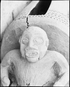 Sculpted figure on a drum, in Bamete