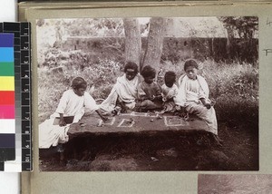 Group of girls playing outdoors, Madagascar, ca. 1913