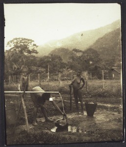 African women fetching water at the well in Nyasoso