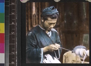 Go-p'u man spinning, south west China, ca. 1949