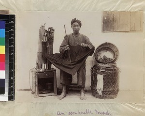 Man mending umbrellas, south China, ca. 1888-1906