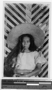 Portrait of a girl smoking, Mexico, ca. 1940-1950