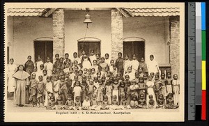 Schoolchildren gathered before a building, Asaripallam, India, ca.1920-1940