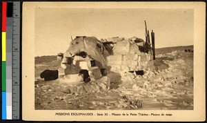 Igloo standing on a flat plain, Canada, ca.1920-1940