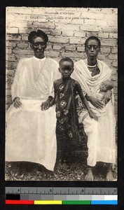 Chief seated with family, Burundi, ca.1920-1940