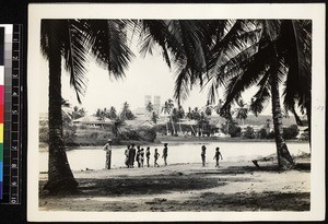 View of missionary and children in front of church, Saltpond, Ghana, 1926