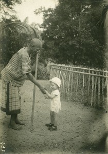 Gabonese with a missionary child, in Gabon