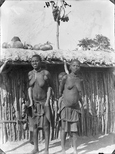 Women carrying children, Tanzania, ca.1893-1920