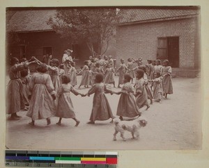 Girls playing outside Antsahamanitra Girls' School, Antananarivo, Madagascar, ca.1900